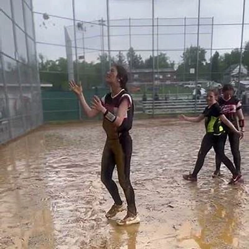 softball in the rain and mud